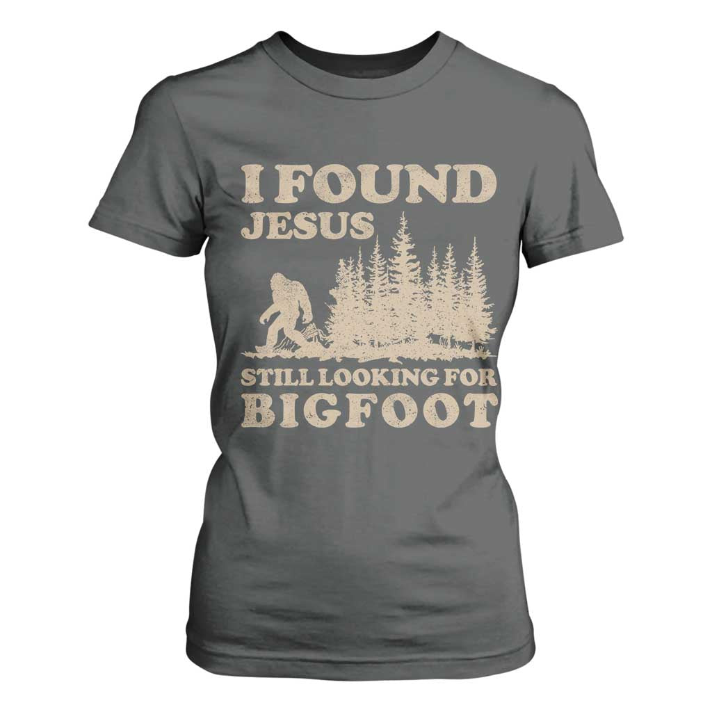 Retro I Found Jesus Still Looking For Bigfoot T Shirt For Women Vintage Sasquatch Believer Funny Christian Humor TS10 Dark Heather Print Your Wear