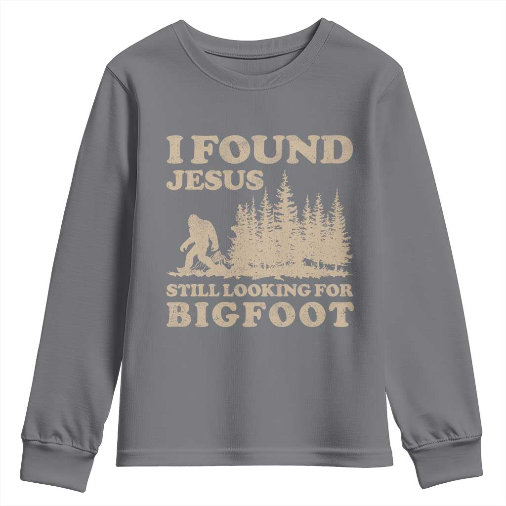 Retro I Found Jesus Still Looking For Bigfoot Youth Sweatshirt Vintage Sasquatch Believer Funny Christian Humor TS10 Charcoal Print Your Wear