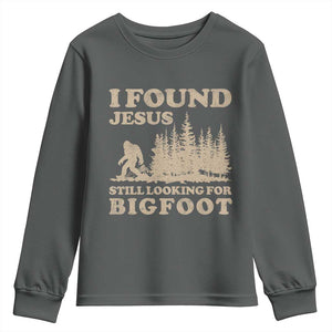 Retro I Found Jesus Still Looking For Bigfoot Youth Sweatshirt Vintage Sasquatch Believer Funny Christian Humor TS10 Dark Heather Print Your Wear
