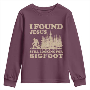 Retro I Found Jesus Still Looking For Bigfoot Youth Sweatshirt Vintage Sasquatch Believer Funny Christian Humor TS10 Maroon Print Your Wear