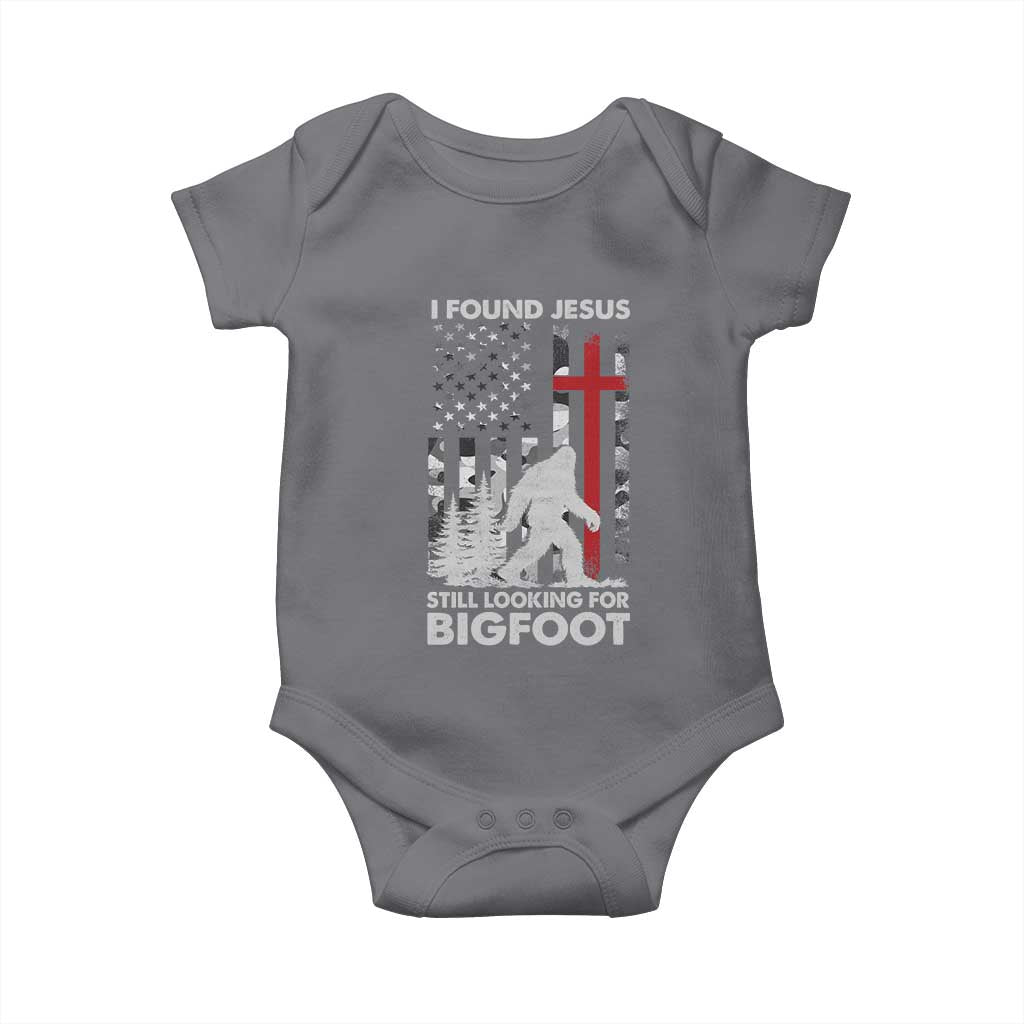 Retro I Found Jesus Still Looking For Bigfoot Baby Onesie Camouflage US American Flag Camo TS10 Charcoal Print Your Wear