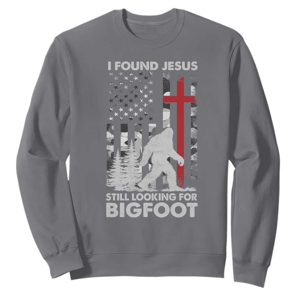 Retro I Found Jesus Still Looking For Bigfoot Sweatshirt Camouflage US American Flag Camo TS10 Charcoal Print Your Wear