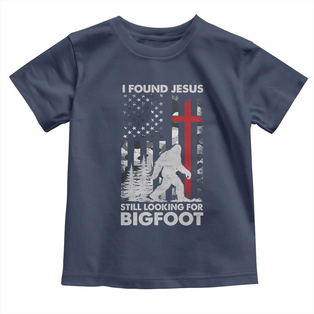 Retro I Found Jesus Still Looking For Bigfoot Toddler T Shirt Camouflage US American Flag Camo TS10 Navy Print Your Wear