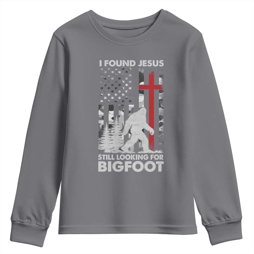 Retro I Found Jesus Still Looking For Bigfoot Youth Sweatshirt Camouflage US American Flag Camo TS10 Charcoal Print Your Wear