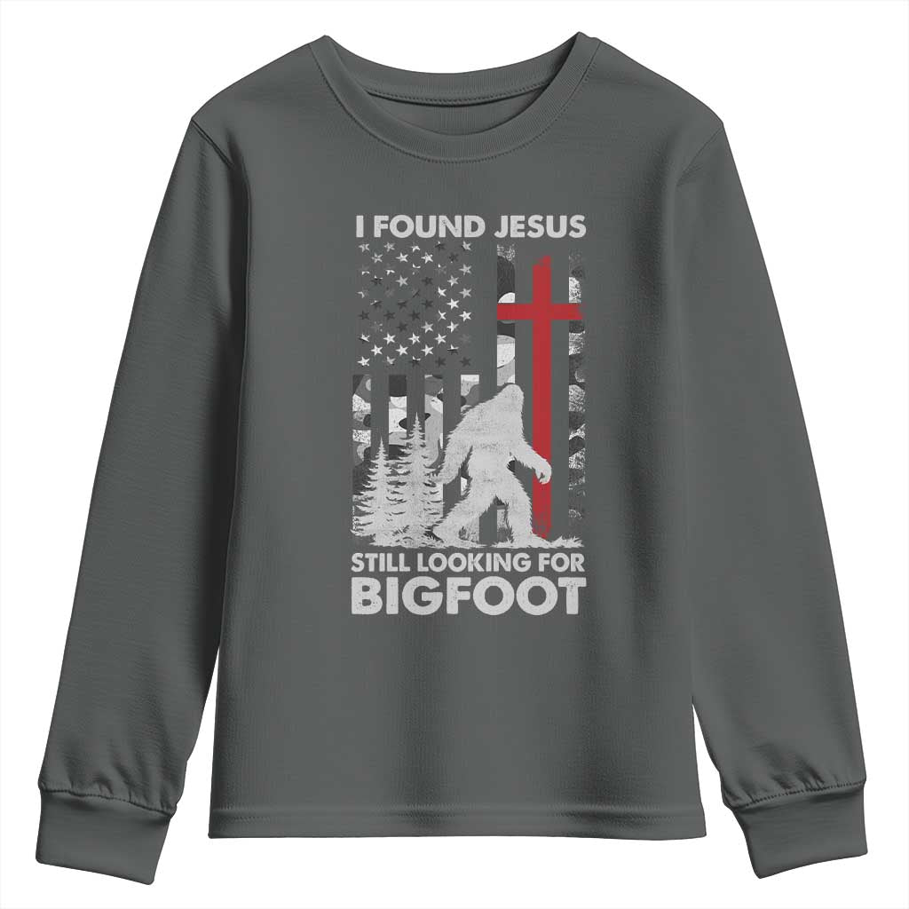Retro I Found Jesus Still Looking For Bigfoot Youth Sweatshirt Camouflage US American Flag Camo TS10 Dark Heather Print Your Wear