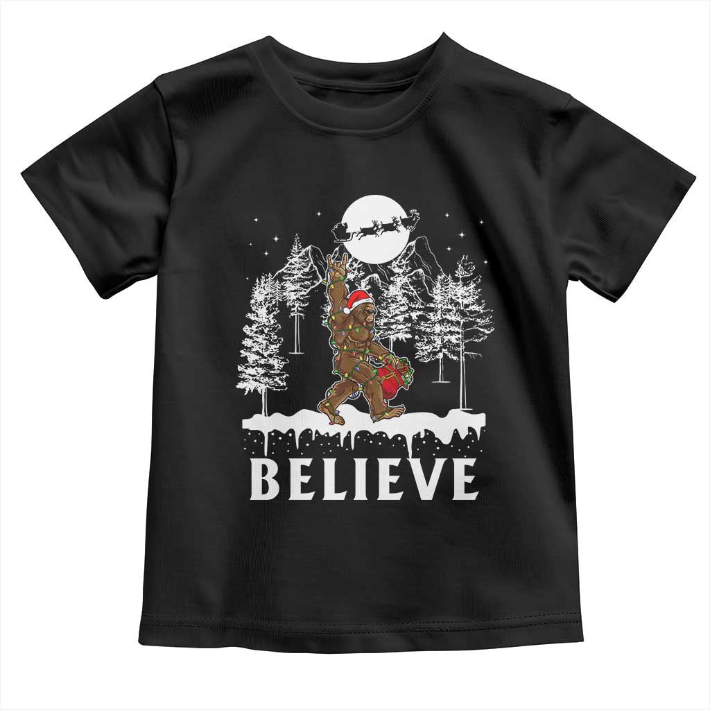 Bigfoot Christmas Tree Lights Baby Shirt Believe Rock On Sasquatch Santa Hat TS10 Black Print Your Wear