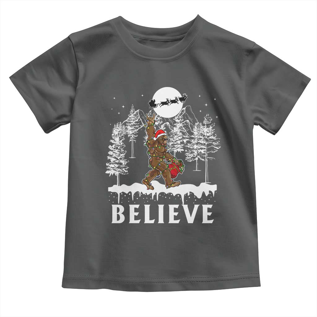 Bigfoot Christmas Tree Lights Baby Shirt Believe Rock On Sasquatch Santa Hat TS10 Dark Heather Print Your Wear