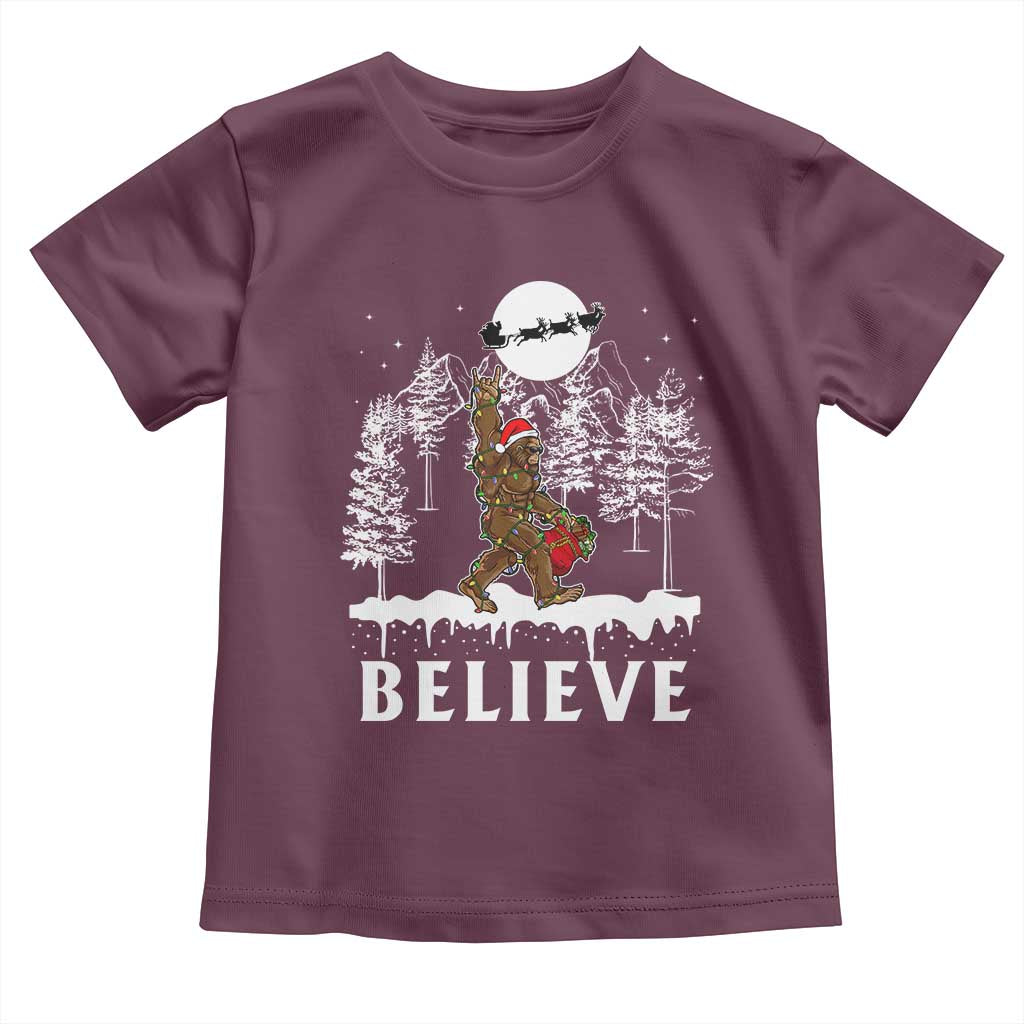 Bigfoot Christmas Tree Lights Baby Shirt Believe Rock On Sasquatch Santa Hat TS10 Maroon Print Your Wear