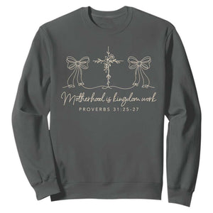 Motherhood Is Kingdom Work Sweatshirt Cute Christian Mom Mothers Day Coquette Bow Cross TS10 Dark Heather Print Your Wear