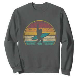 Vintage Bigfoot Surfing Sweatshirt Sasquatch Beach Vacation Retro Surf Sun Shaka TS10 Dark Heather Print Your Wear