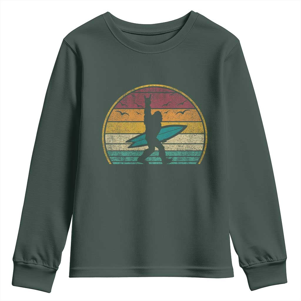 Vintage Bigfoot Surfing Youth Sweatshirt Sasquatch Beach Vacation Retro Surf Sun Shaka TS10 Dark Forest Green Print Your Wear