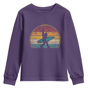 Vintage Bigfoot Surfing Youth Sweatshirt Sasquatch Beach Vacation Retro Surf Sun Shaka TS10 Purple Print Your Wear