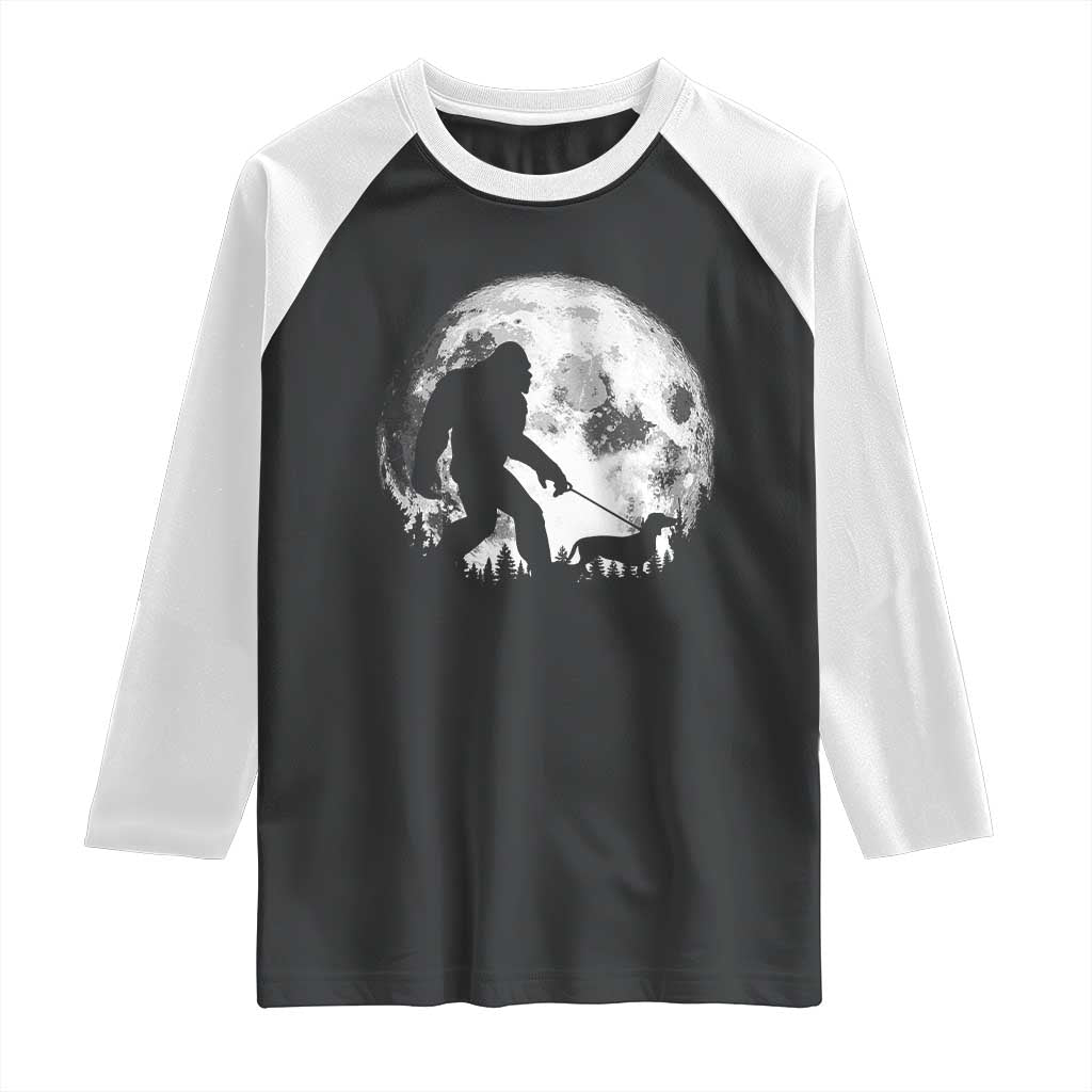 Bigfoot Walking Dachshund Raglan Shirt Funny Doxie Wiener Sasquatch Night Stroll Full Moon TS10 Black White Print Your Wear