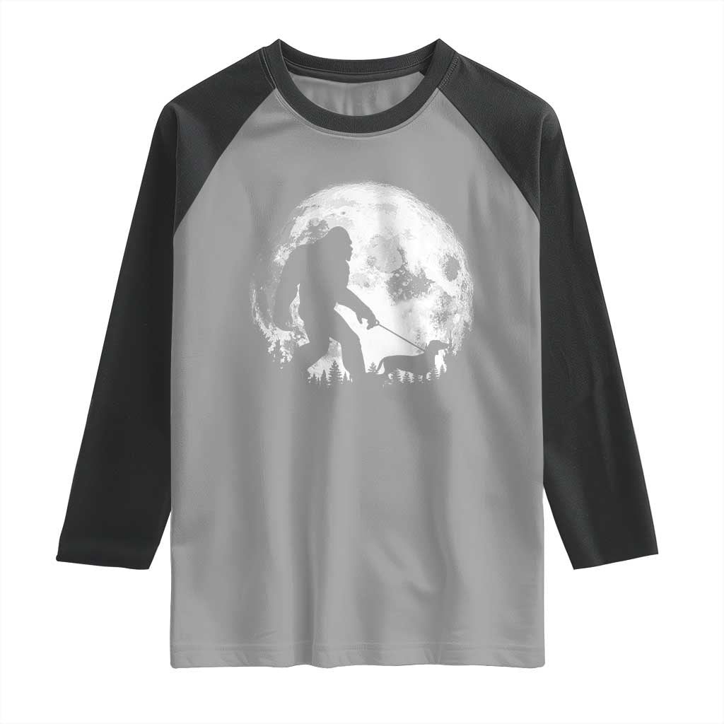 Bigfoot Walking Dachshund Raglan Shirt Funny Doxie Wiener Sasquatch Night Stroll Full Moon TS10 Sport Gray Black Print Your Wear