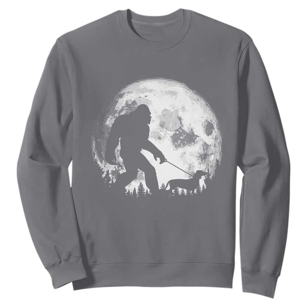 Bigfoot Walking Dachshund Sweatshirt Funny Doxie Wiener Sasquatch Night Stroll Full Moon TS10 Charcoal Print Your Wear