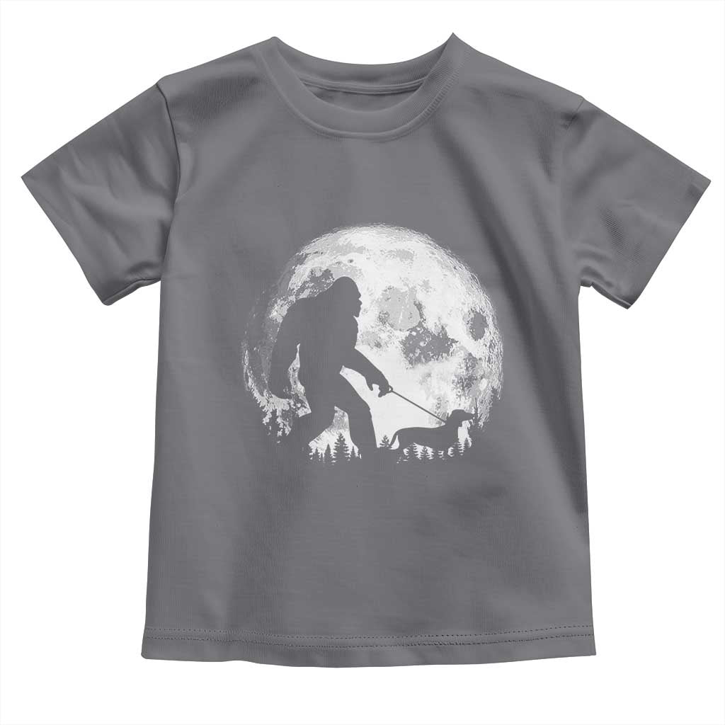 Bigfoot Walking Dachshund Toddler T Shirt Funny Doxie Wiener Sasquatch Night Stroll Full Moon TS10 Charcoal Print Your Wear