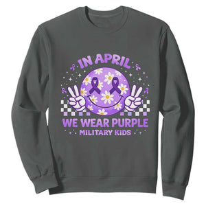 Proud Military Kids Sweatshirt Groovy Smile Face In April We Wear Purple Military Child Month TS10 Dark Heather Print Your Wear