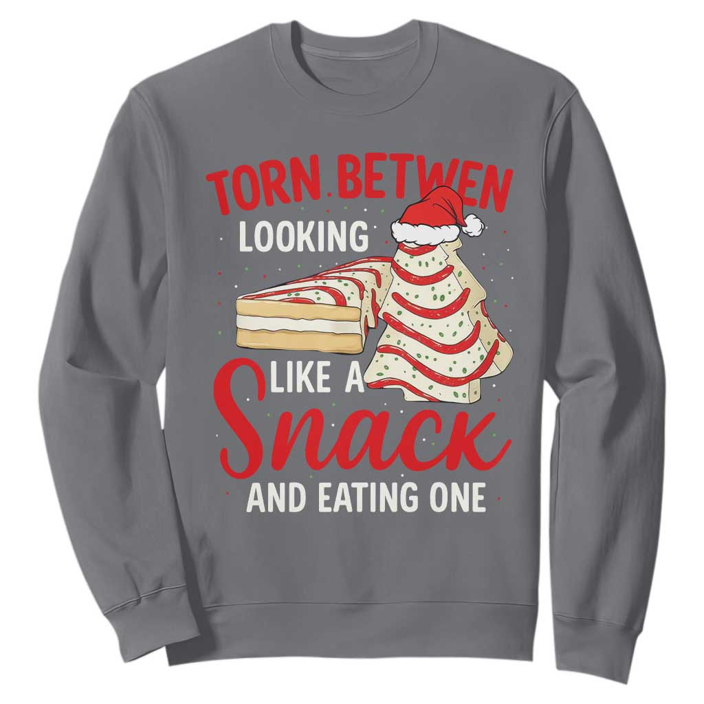 Torn Between Looking Like A Snack Or Eating One Christmas Sweatshirt Debbies Tree Cake TS10 Charcoal Print Your Wear