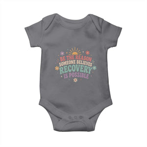 Be The Reason Someone Believes Recovery Is Possible Graphic Baby Onesie Groovy Graphic