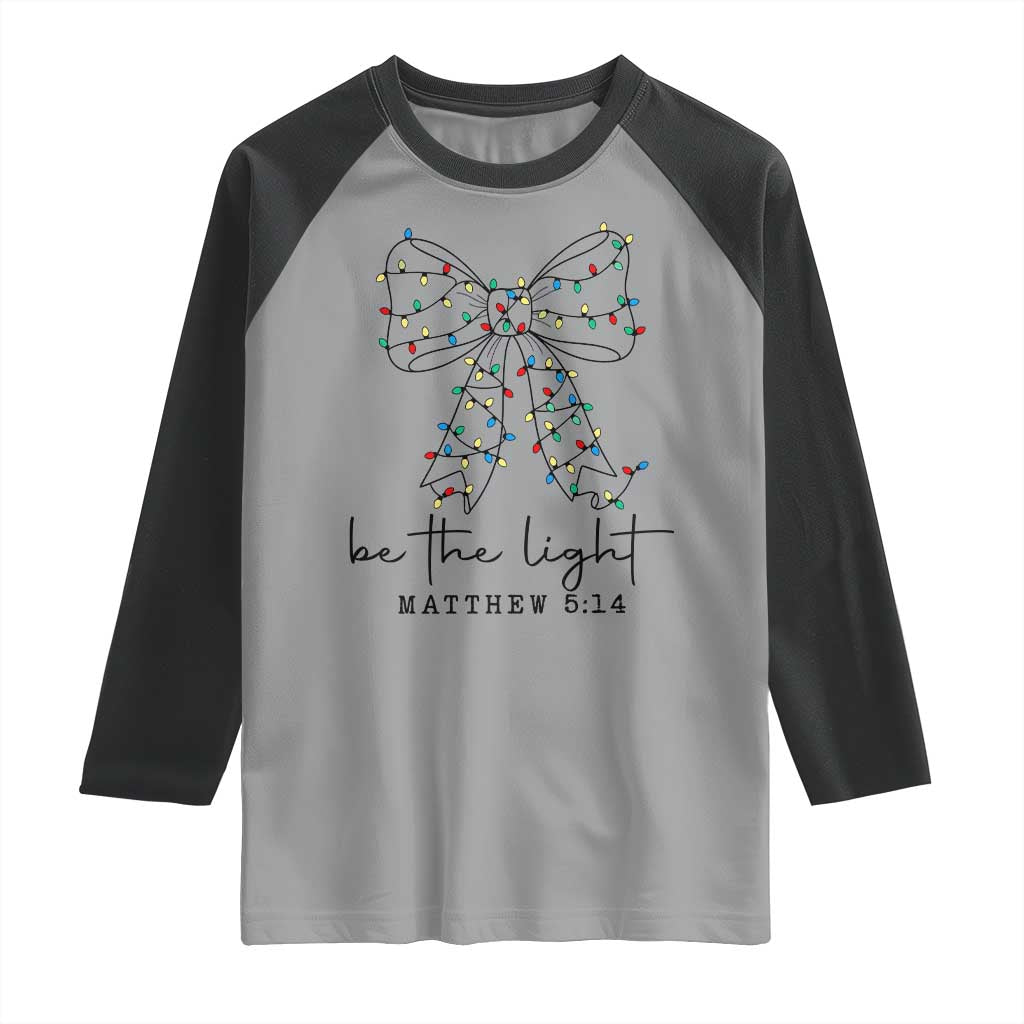 Be The Light Christmas Coquette Bow Raglan Shirt Christian Religious Bible Verse TS10 Sport Gray Black Print Your Wear