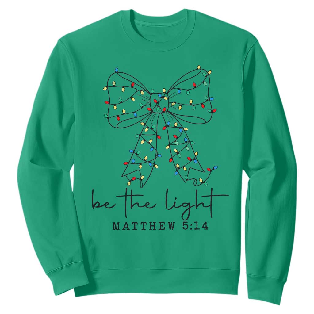 Be The Light Christmas Coquette Bow Sweatshirt Christian Religious Bible Verse TS10 Irish Green Print Your Wear