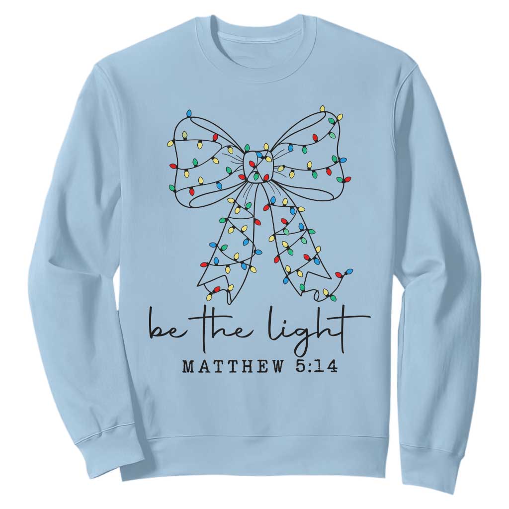 Be The Light Christmas Coquette Bow Sweatshirt Christian Religious Bible Verse TS10 Light Blue Print Your Wear