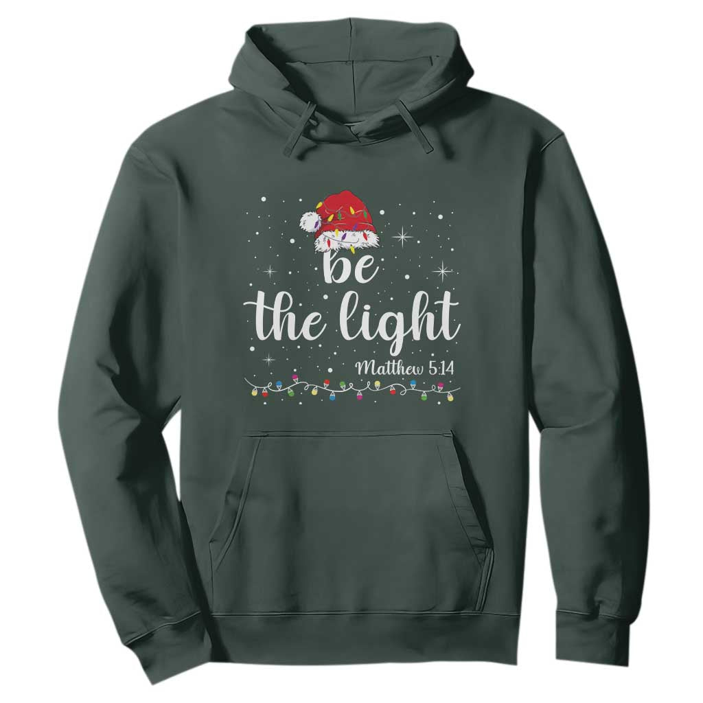 Be The Light Christmas Hoodie Christian Religious Bible Verse Santa Hat Pajama TS10 Dark Forest Green Print Your Wear
