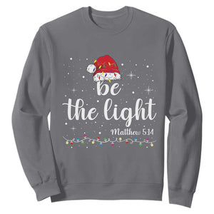 Be The Light Christmas Sweatshirt Christian Religious Bible Verse Santa Hat Pajama TS10 Charcoal Print Your Wear