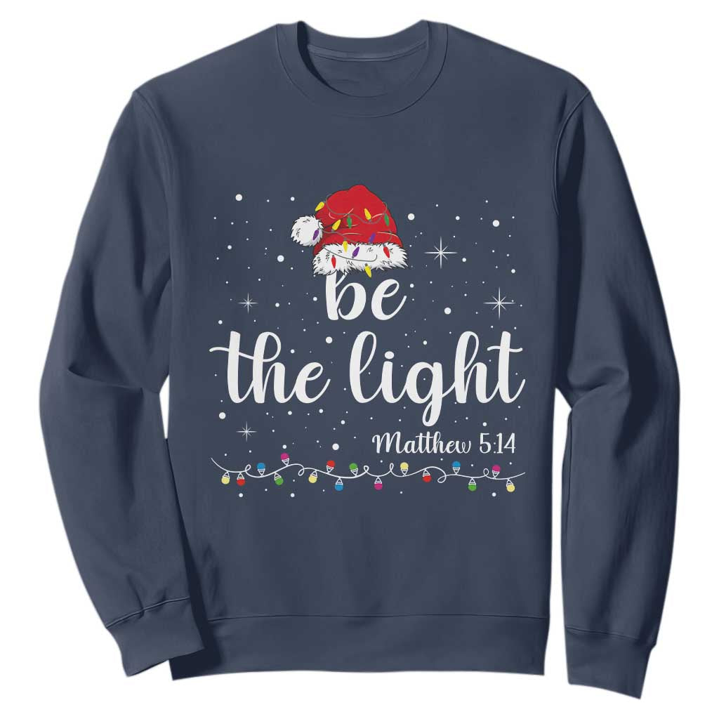 Be The Light Christmas Sweatshirt Christian Religious Bible Verse Santa Hat Pajama TS10 Navy Print Your Wear