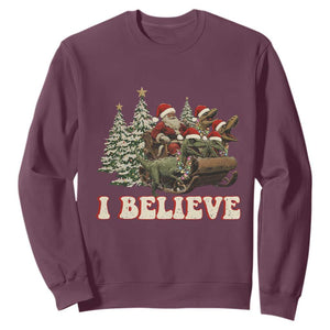 Christmas Santa Sweatshirt Riding Dinosaur T rex Boys Men Girls Believe Xmas Squad TS10 Maroon Print Your Wear