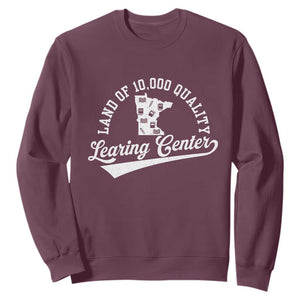 Funny Land Of 10000 Learing Center 2025 Sweatshirt Anti Scam Awareness School Quote TS11 Maroon Print Your Wear