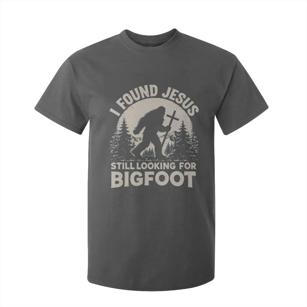 I Found Jesus Still Looking For Bigfoot T Shirt For Kid Funny Christian Sasquatch Forest TS11 Dark Heather Print Your Wear