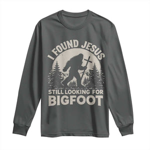 I Found Jesus Still Looking For Bigfoot Long Sleeve Shirt Funny Christian Sasquatch Forest TS11 Dark Heather Print Your Wear