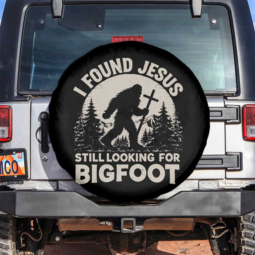 I Found Jesus Still Looking For Bigfoot Spare Tire Cover Funny Christian Sasquatch Forest TS11 No hole Black Print Your Wear