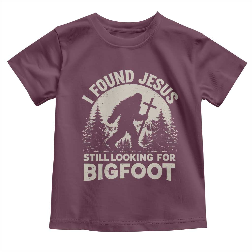 I Found Jesus Still Looking For Bigfoot Toddler T Shirt Funny Christian Sasquatch Forest TS11 Maroon Print Your Wear