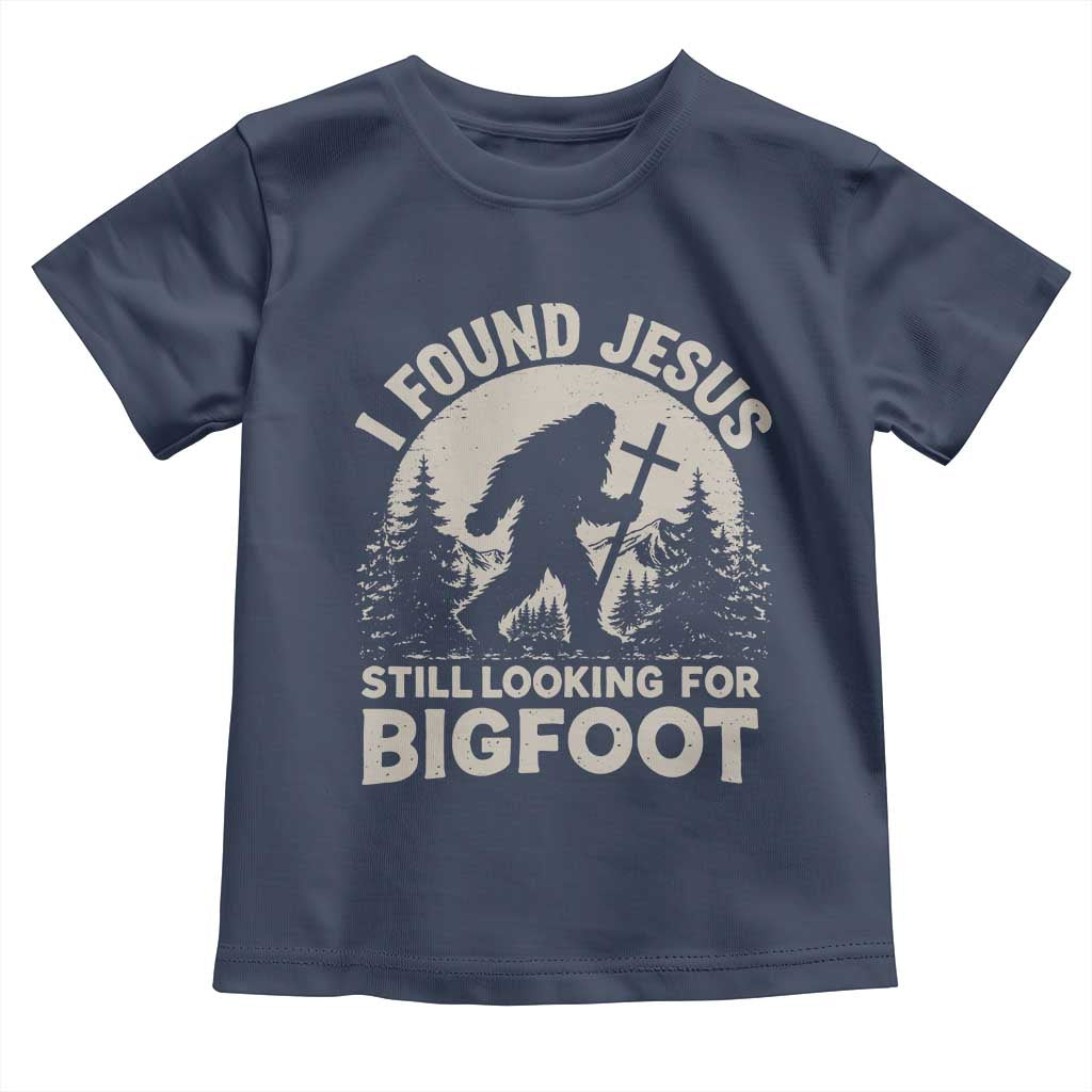 I Found Jesus Still Looking For Bigfoot Toddler T Shirt Funny Christian Sasquatch Forest TS11 Navy Print Your Wear