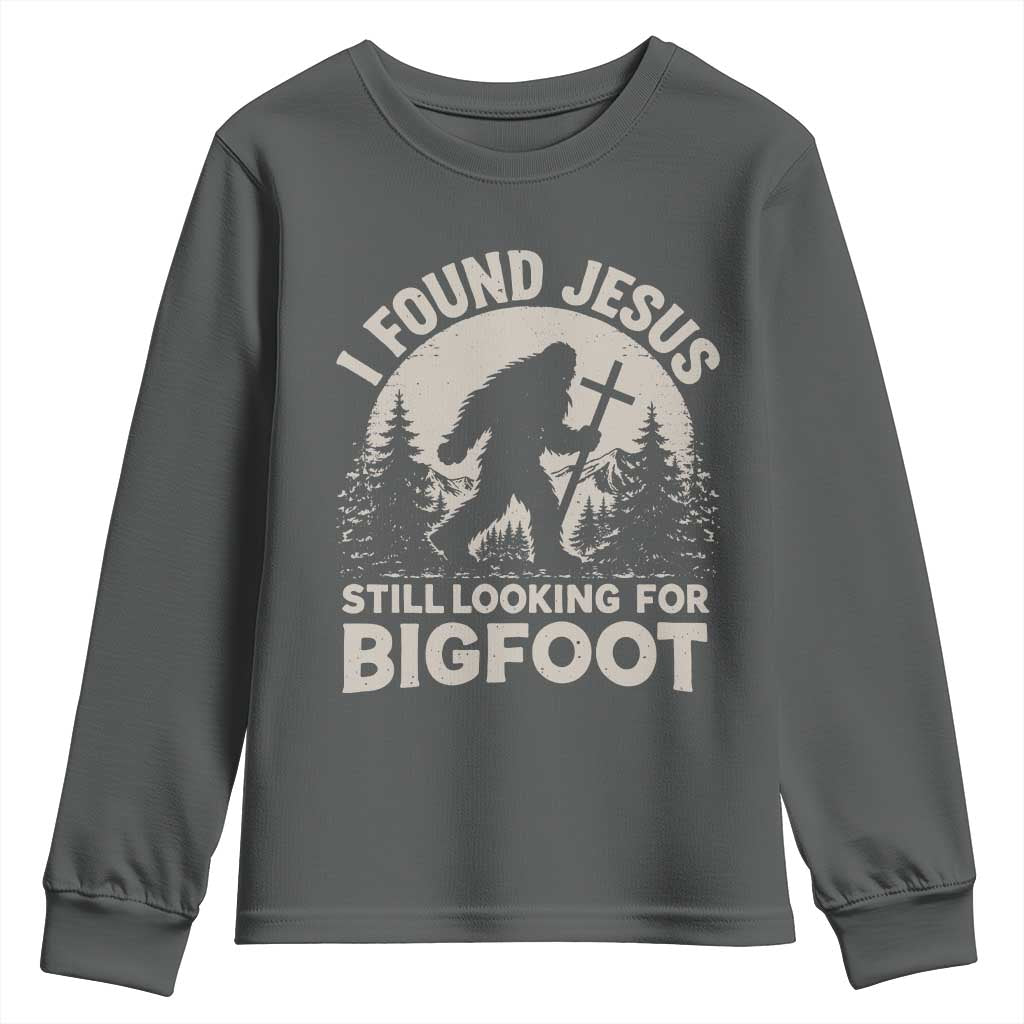 I Found Jesus Still Looking For Bigfoot Youth Sweatshirt Funny Christian Sasquatch Forest TS11 Dark Heather Print Your Wear
