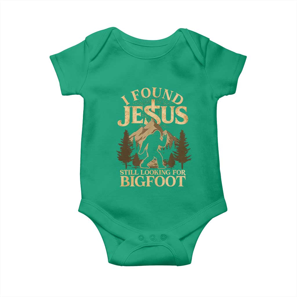 I Found Jesus Still Looking For Bigfoot Baby Onesie Funny Christian Sasquatch Vintage Mountain TS11 Irish Green Print Your Wear