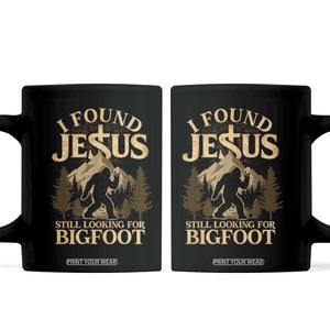 I Found Jesus Still Looking For Bigfoot Coffee Mug Funny Christian Sasquatch Vintage Mountain TS11 Black Print Your Wear