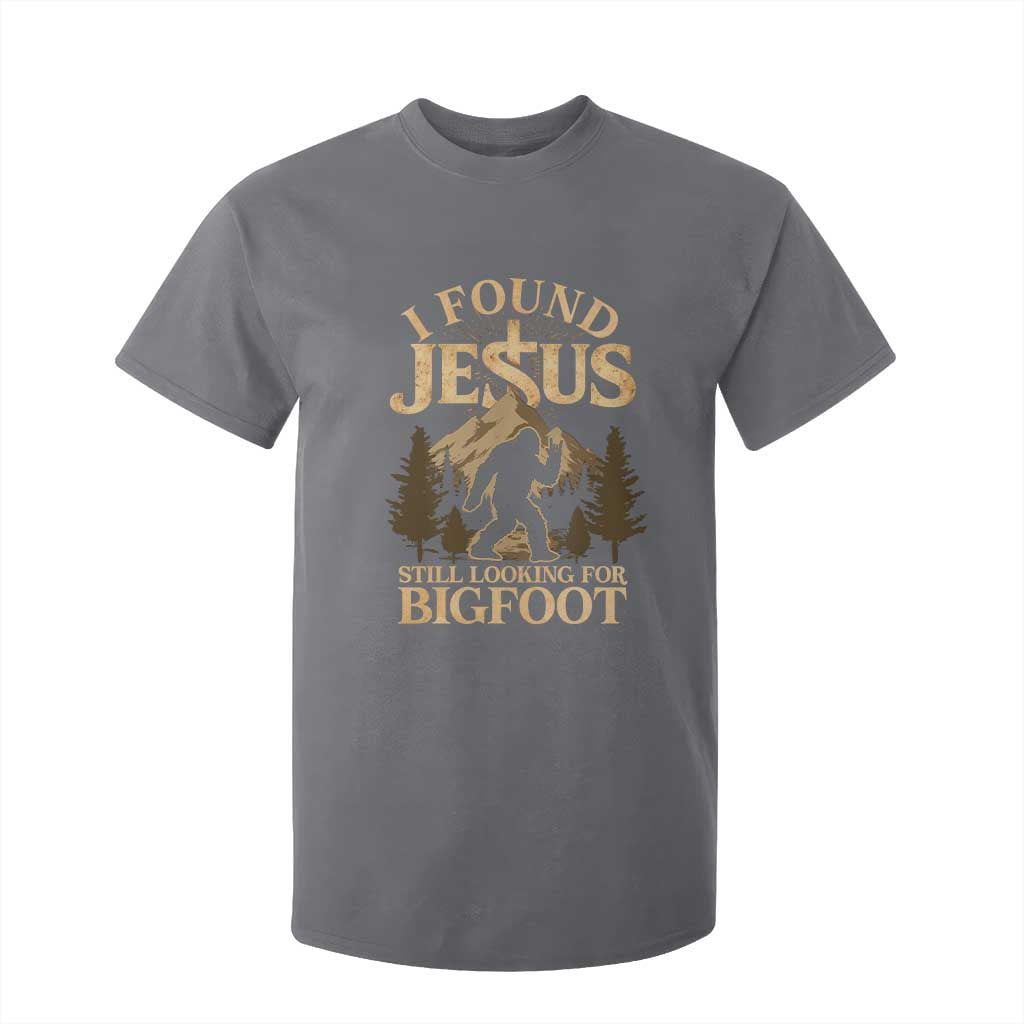 I Found Jesus Still Looking For Bigfoot T Shirt For Kid Funny Christian Sasquatch Vintage Mountain TS11 Charcoal Print Your Wear