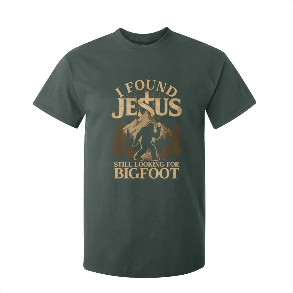 I Found Jesus Still Looking For Bigfoot T Shirt For Kid Funny Christian Sasquatch Vintage Mountain TS11 Dark Forest Green Print Your Wear