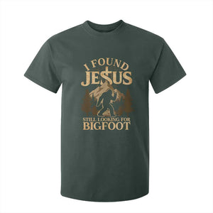 I Found Jesus Still Looking For Bigfoot T Shirt For Kid Funny Christian Sasquatch Vintage Mountain TS11 Dark Forest Green Print Your Wear
