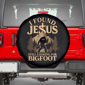 I Found Jesus Still Looking For Bigfoot Spare Tire Cover Funny Christian Sasquatch Vintage Mountain TS11 Black Print Your Wear