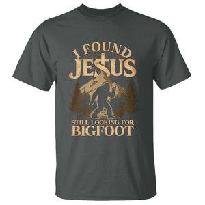 I Found Jesus Still Looking For Bigfoot T Shirt Funny Christian Sasquatch Vintage Mountain TS11 Dark Heather Print Your Wear