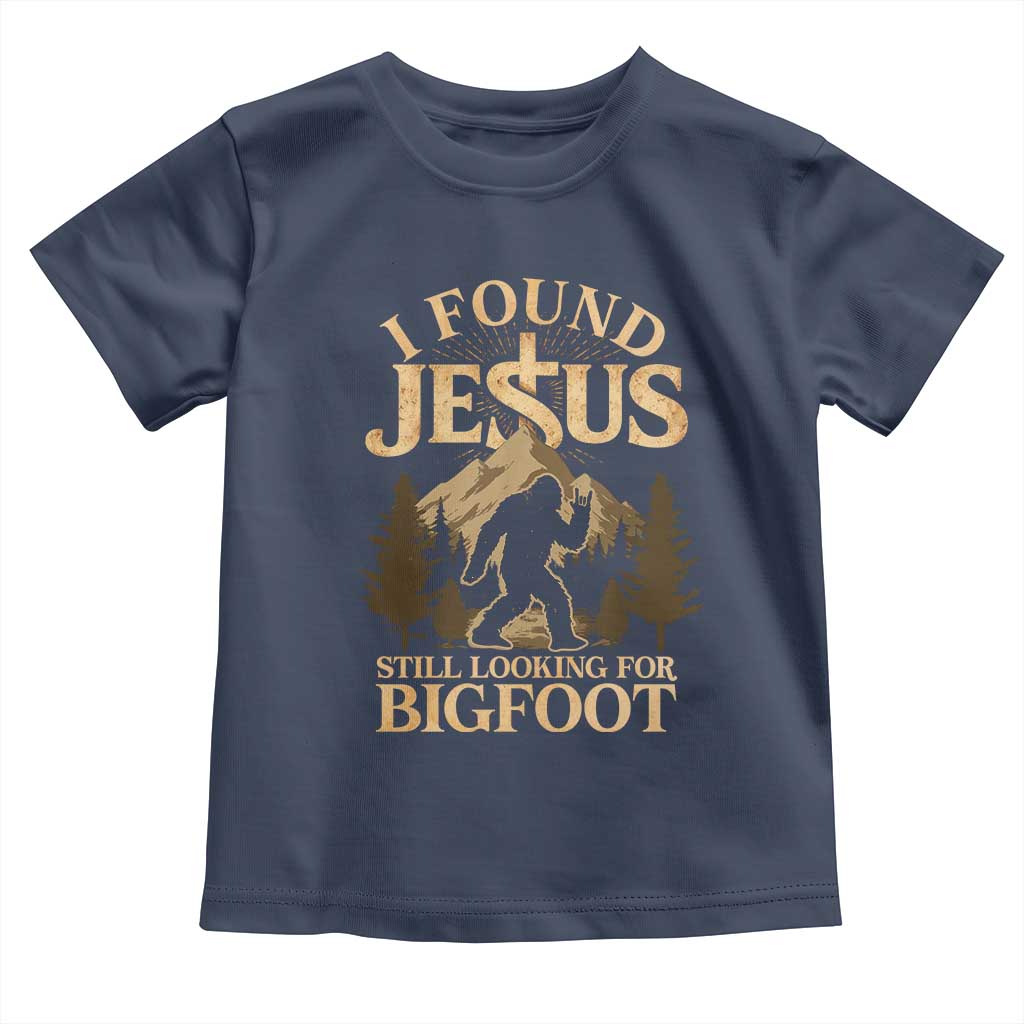 I Found Jesus Still Looking For Bigfoot Toddler T Shirt Funny Christian Sasquatch Vintage Mountain TS11 Navy Print Your Wear