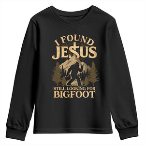 I Found Jesus Still Looking For Bigfoot Youth Sweatshirt Funny Christian Sasquatch Vintage Mountain TS11 Black Print Your Wear