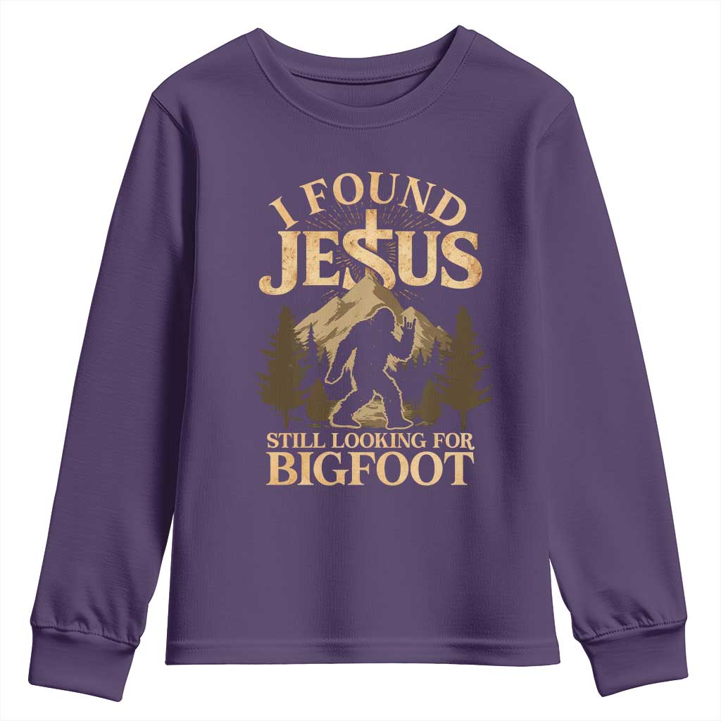 I Found Jesus Still Looking For Bigfoot Youth Sweatshirt Funny Christian Sasquatch Vintage Mountain TS11 Purple Print Your Wear