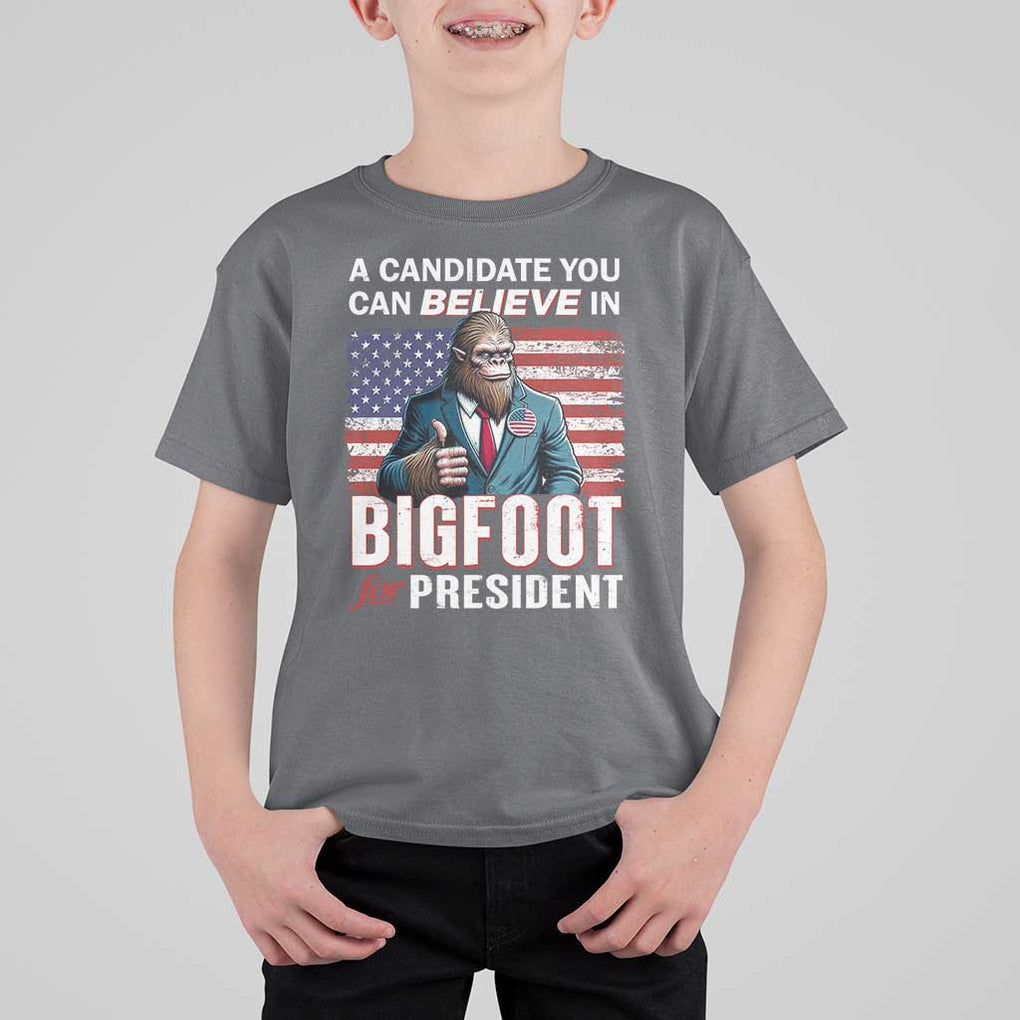 Funny Bigfoot For President T Shirt For Kid A Candidate You Can Believe In 2024 Sasquatch USA Flag TS11 Charcoal Print Your Wear