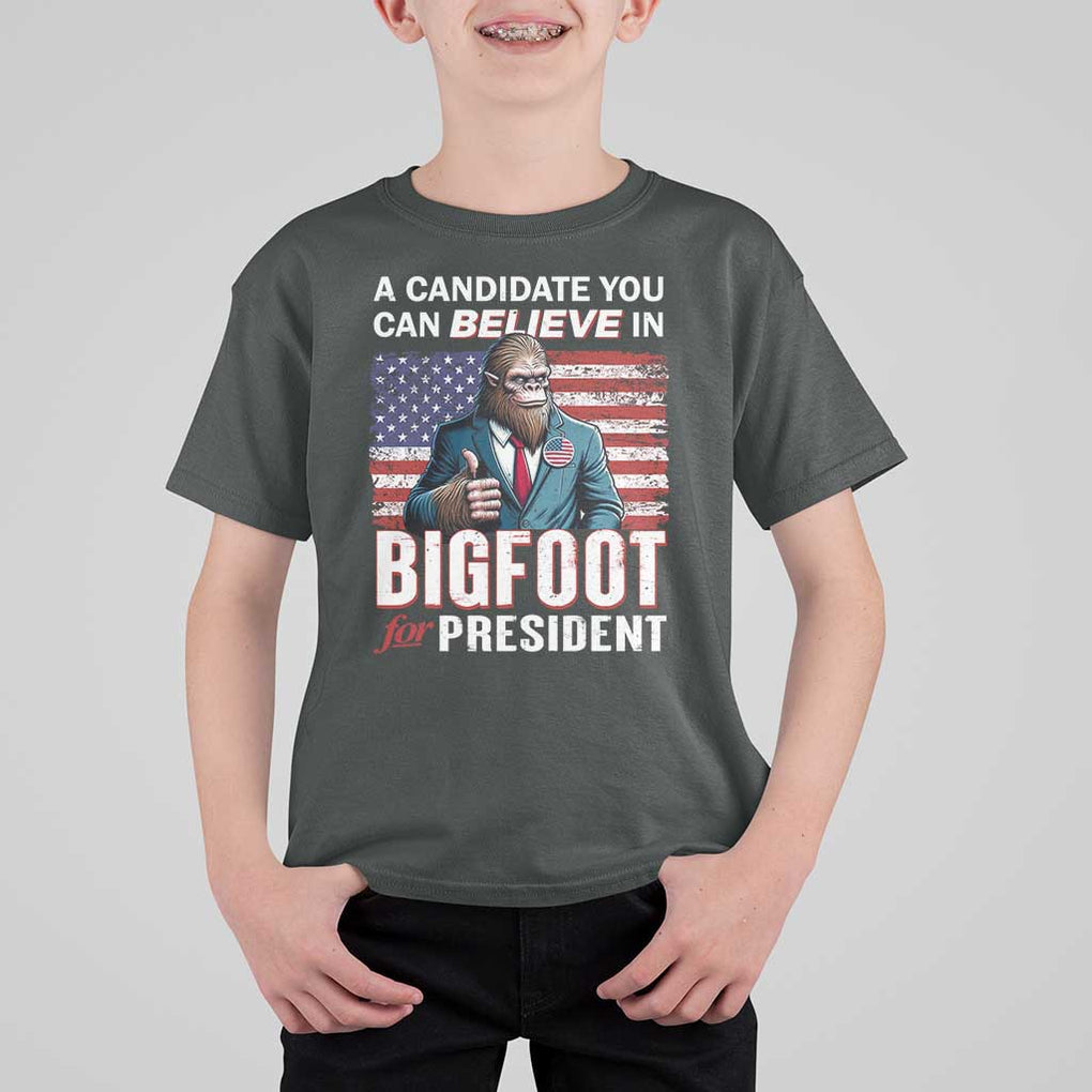 Funny Bigfoot For President T Shirt For Kid A Candidate You Can Believe In 2024 Sasquatch USA Flag TS11 Dark Heather Print Your Wear
