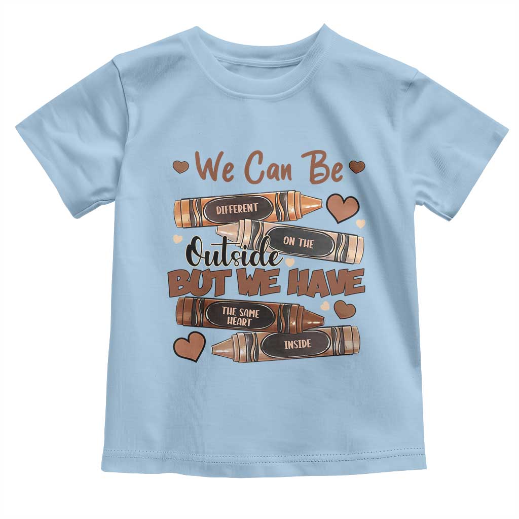 African American Teacher Toddler T Shirt We Can Be Different On The Outside But We Have The Same Heart Inside Melanin Crayons TS11 Light Blue Print Your Wear